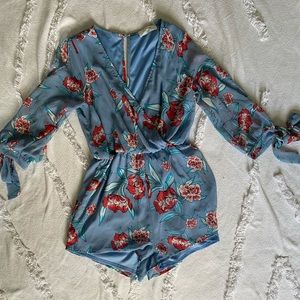 Floral romper size SMALL